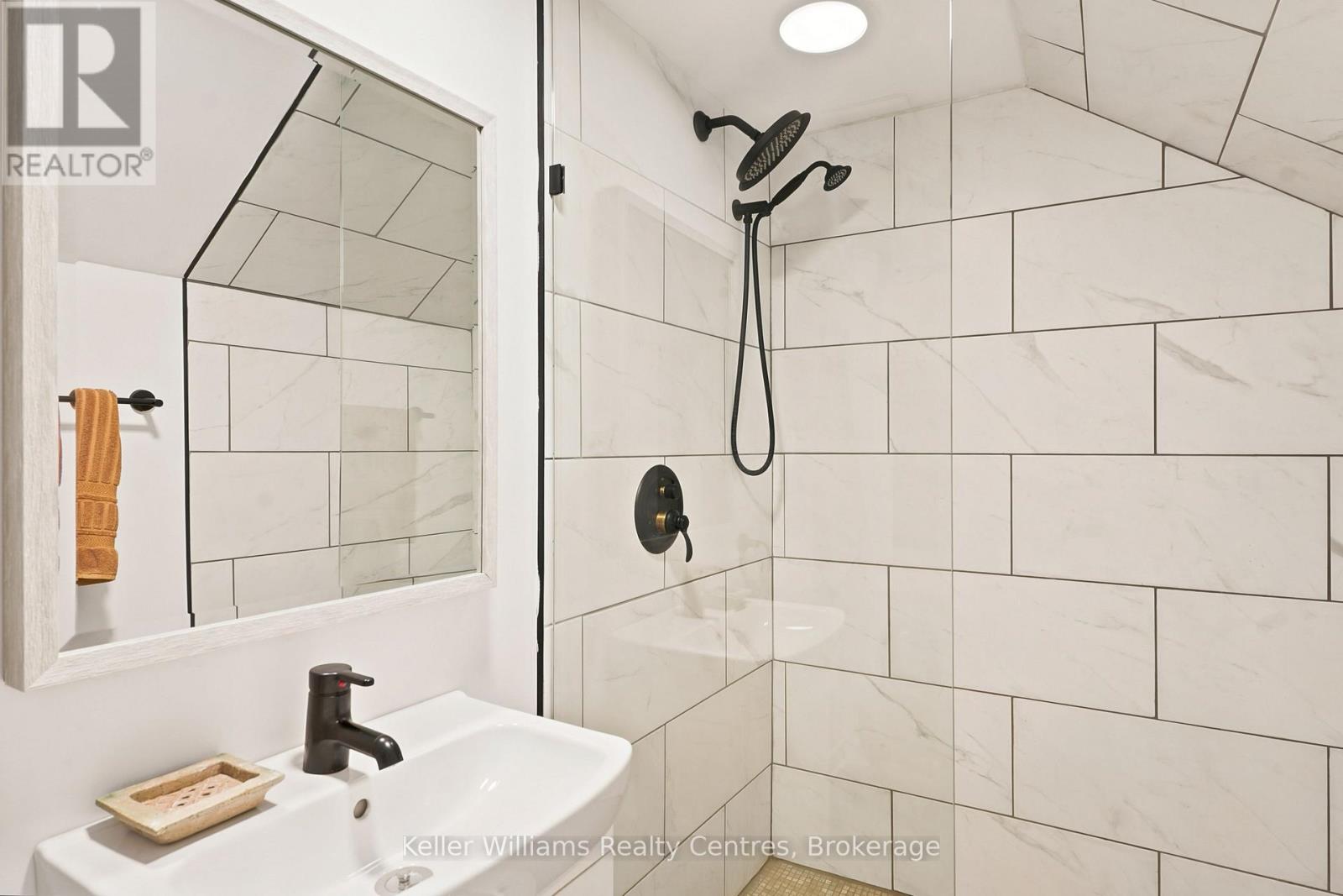 Tiled walk-in glass shower